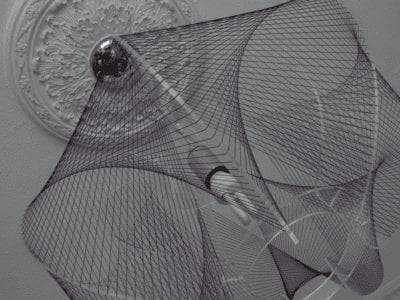 A black and white photo of a net hanging from a ceiling, featuring bespoke offers for Barclaycard.