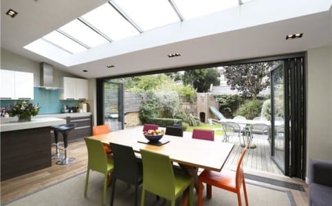 A good family home featuring a kitchen and dining room with a skylight.