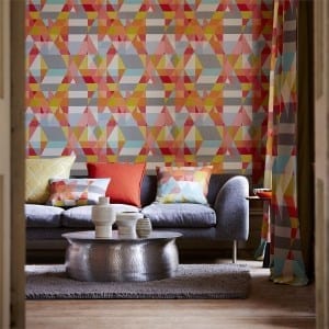 A living room featuring the vibrant Scion Axis wallpaper from the Spirit and Soul Collection.
