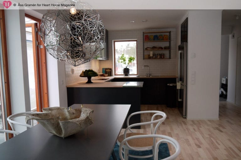 A kitchen with a 2016 table and chairs.