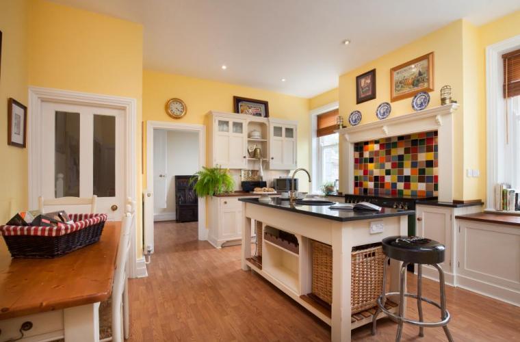 Wolborough House - a perfect holiday home in South Devon with yellow walls and wooden floors.
