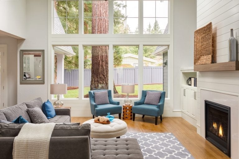 A living room with replacement windows.