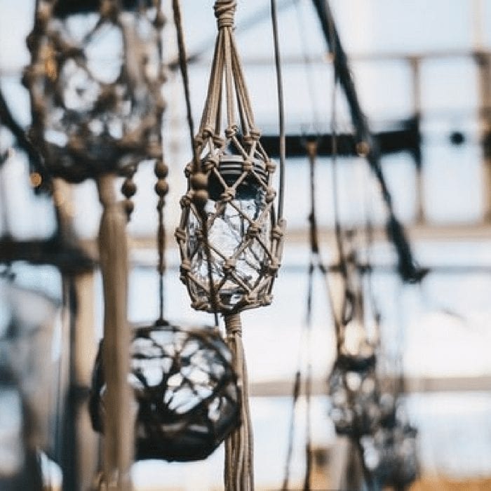 2018 Macrame DIY Trends: Hanging lanterns in a greenhouse.