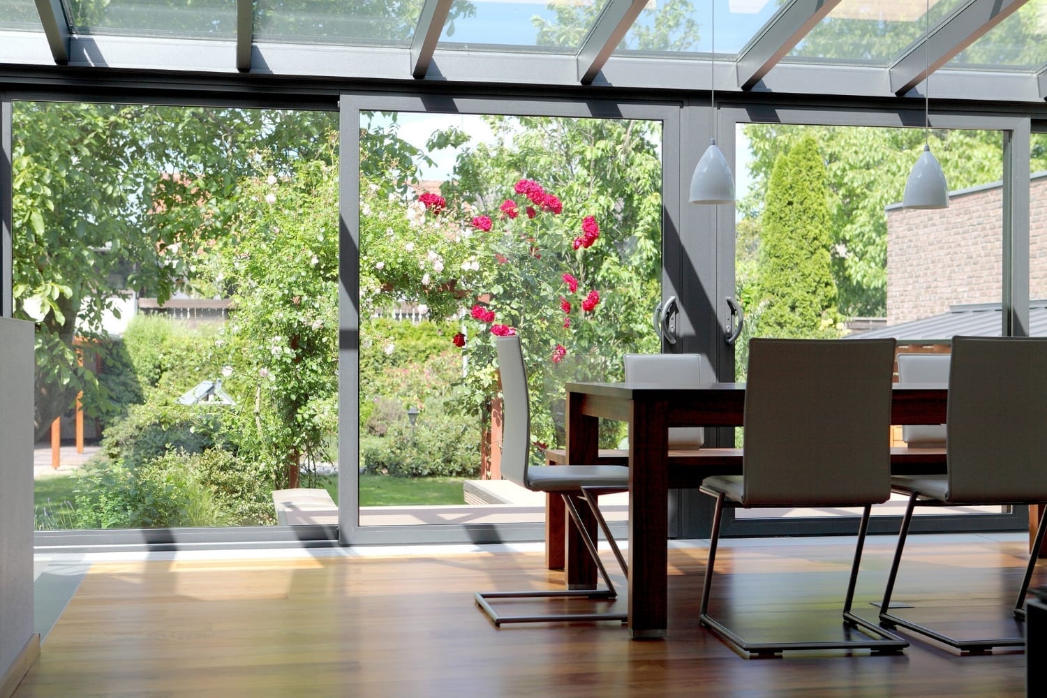 A dining room with a glass roof, perfect for natural light and star-gazing.
