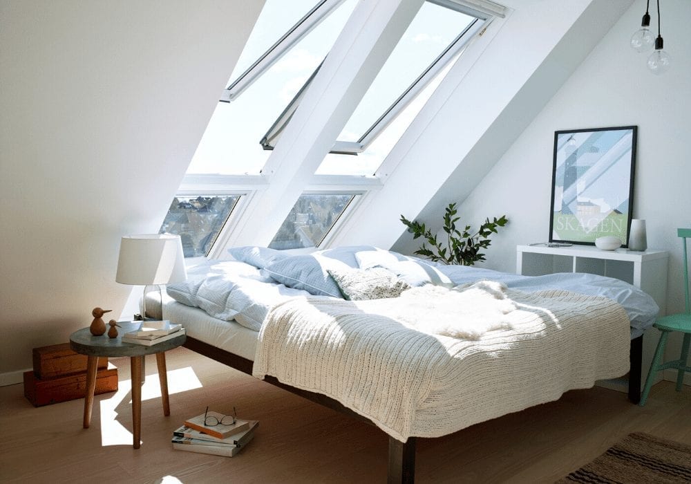 loft bedroom witih bed and roof windows