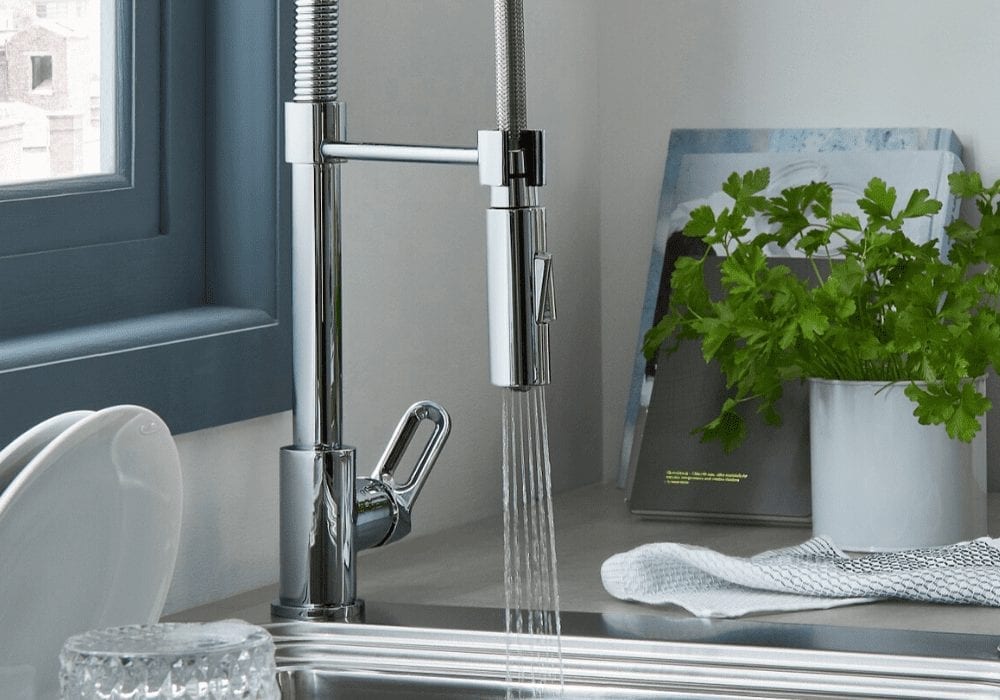 Transform your kitchen with a sleek sink and faucet.