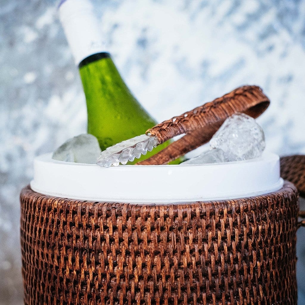 Brown rattan ice bucket with bottle