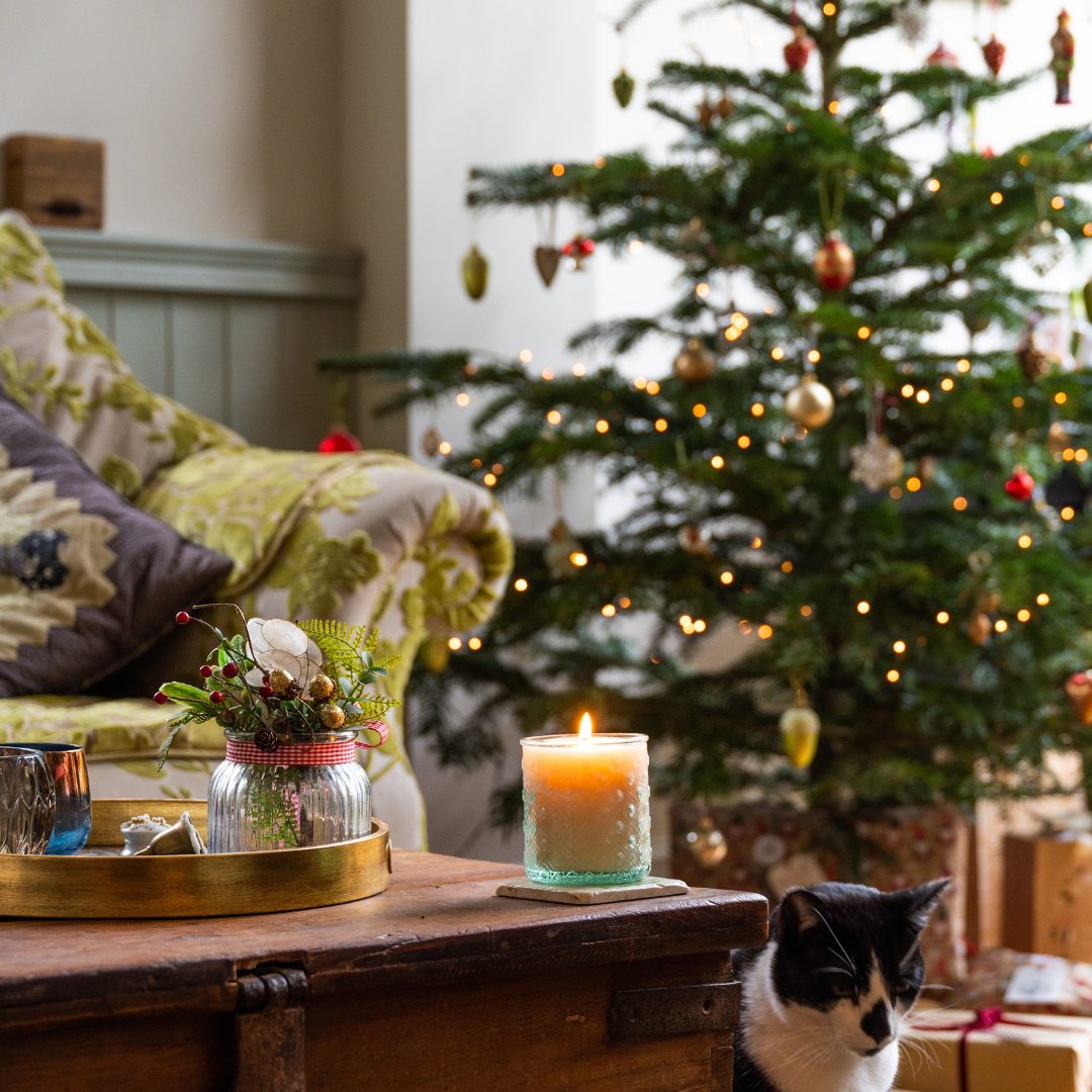 Transform your living room into a festive space with a magnificent Christmas tree.