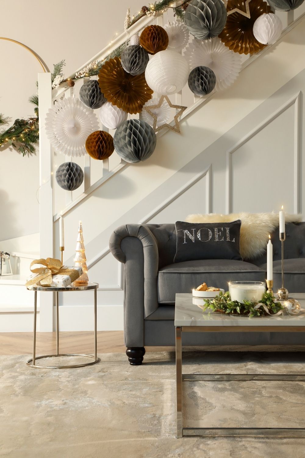 A living room beautifully decorated for Christmas, featuring festive coffee table ideas.
