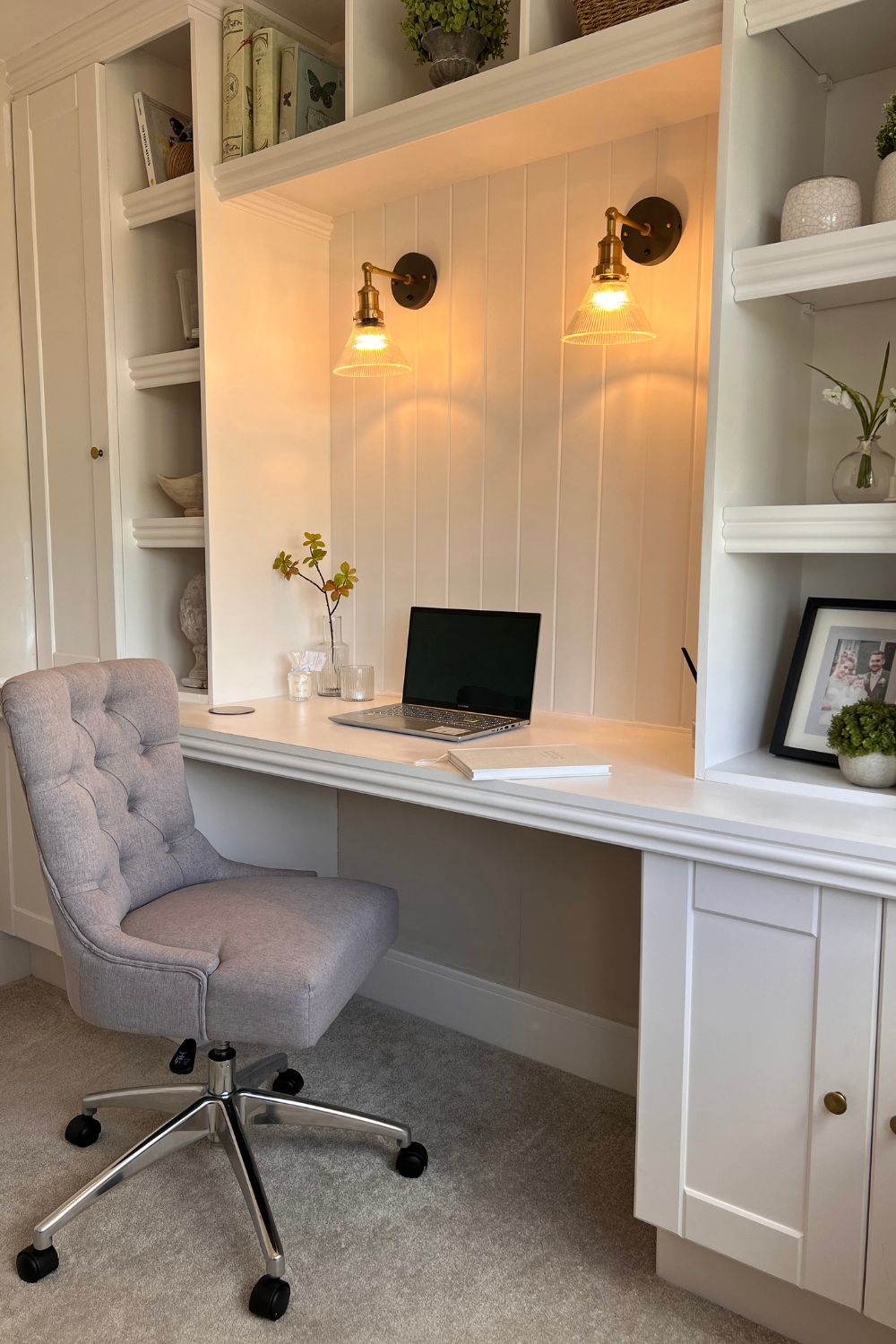 A white home office furnished with a desk and chair designed for promoting good posture. Perfect for any home worker.