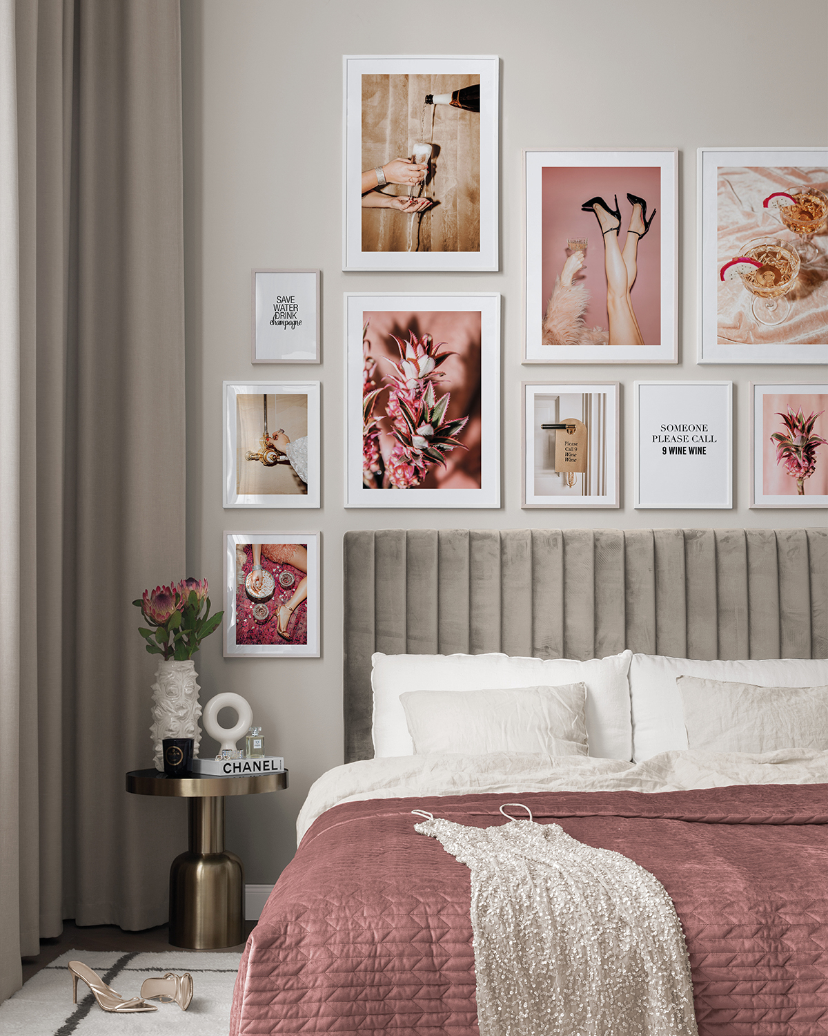 An upgraded bedroom with framed pictures on the wall.