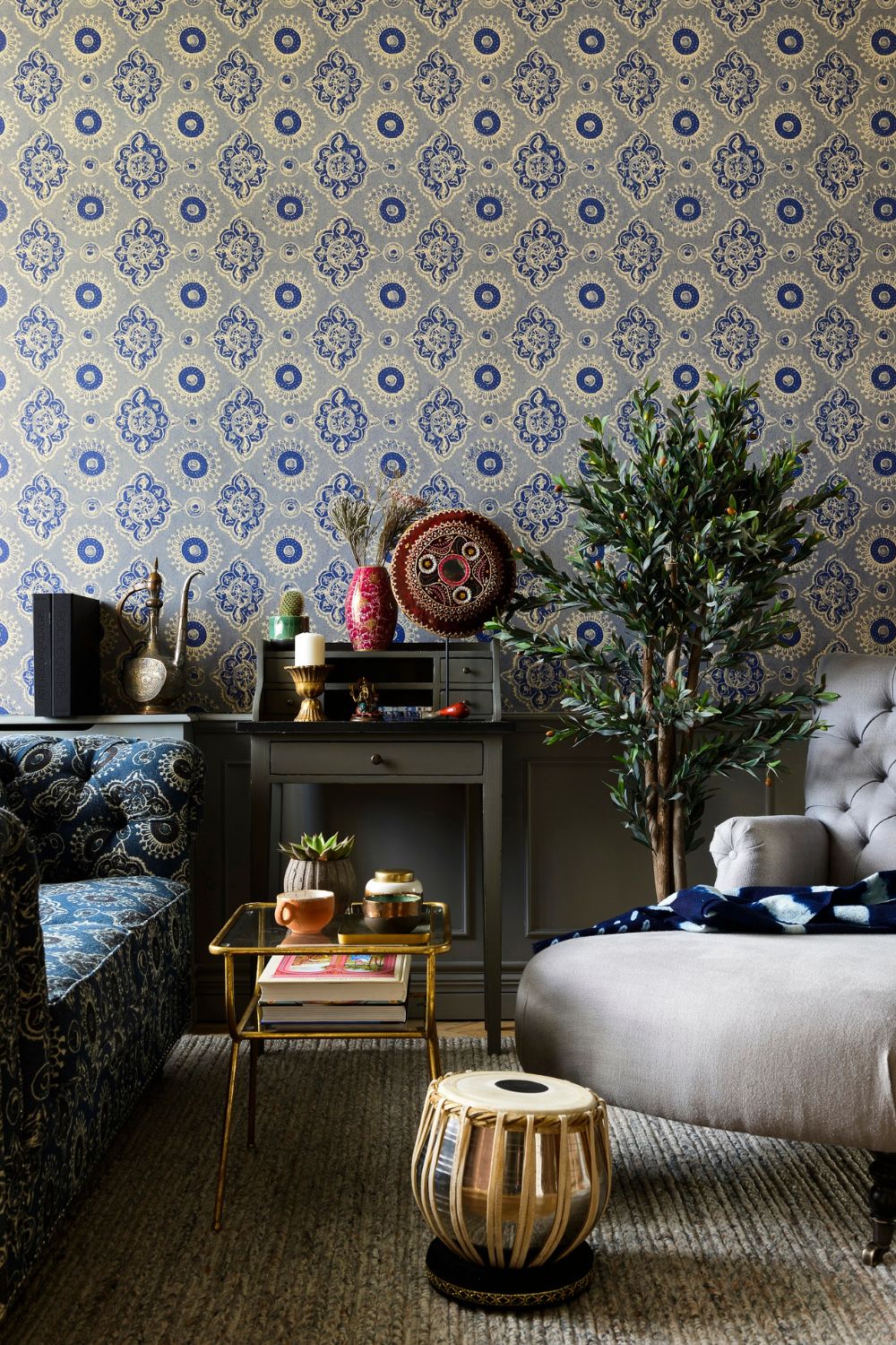 A cosy living room with a warm sofa and a coffee table.