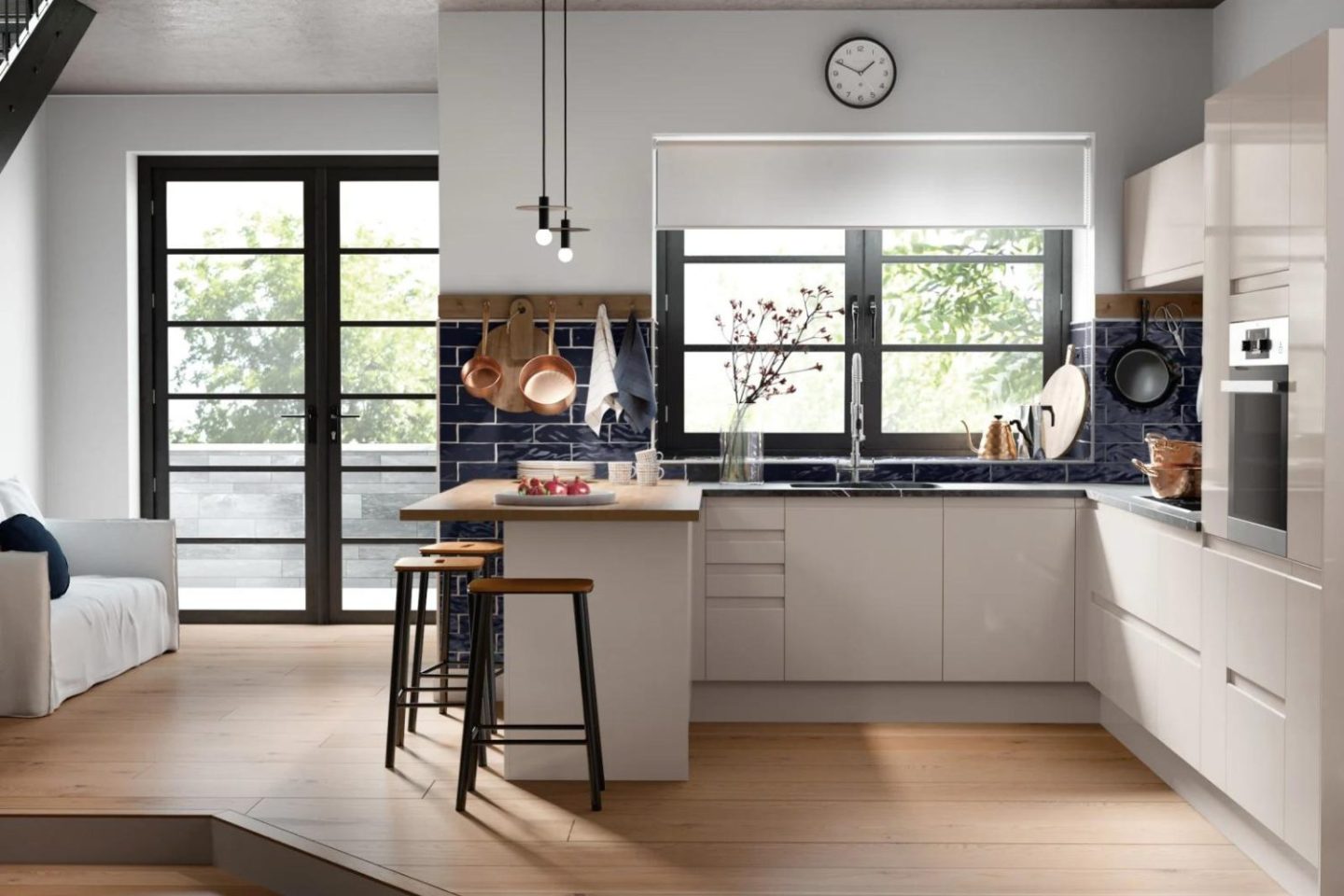 A popular kitchen with a wooden floor and white walls.