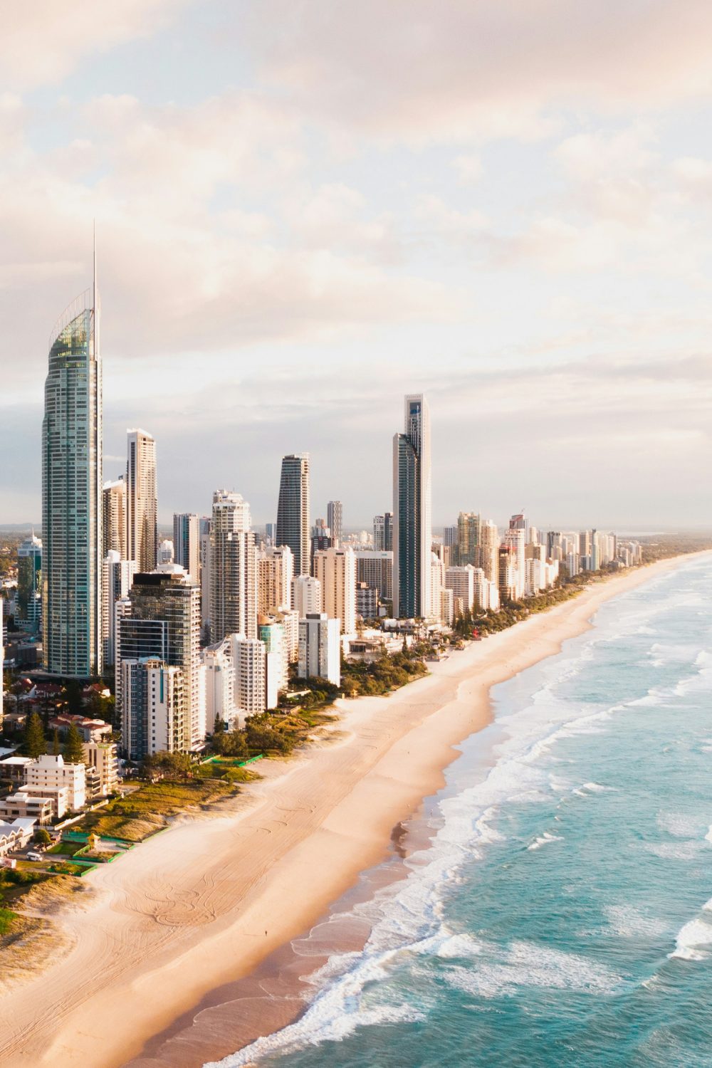 Long beach with high-rise buildings on the shoreline