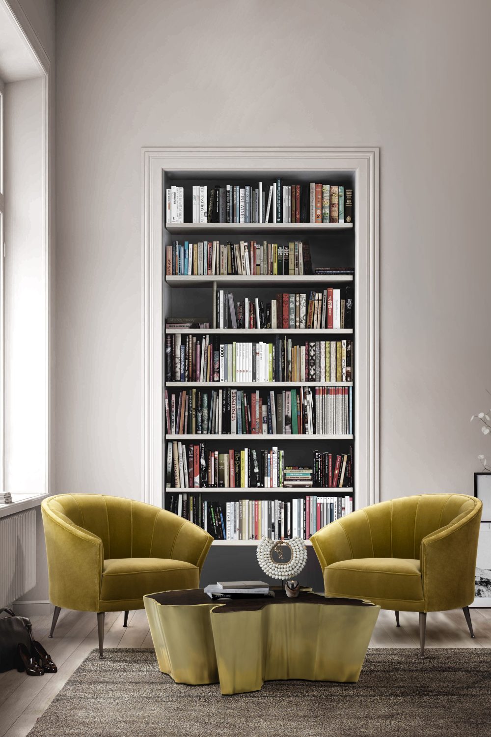 Built-in bookshelf in white wall behind two green armchairs and gold table