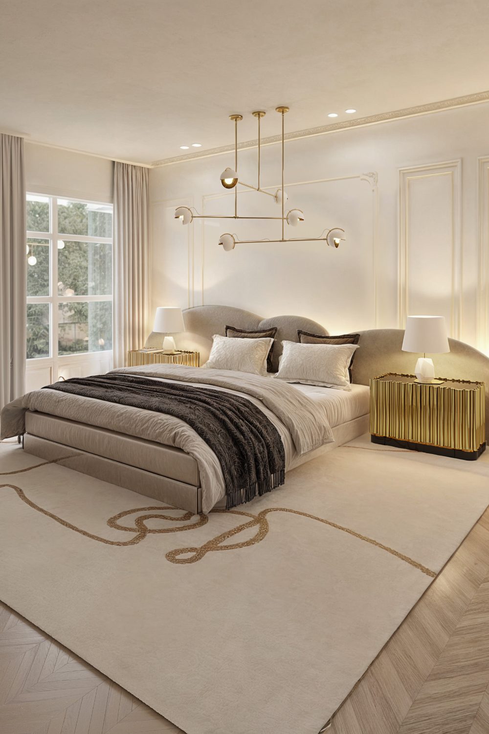 White bedroom with brown cloud headboard, white rug, gold lighting and gold bedside tables