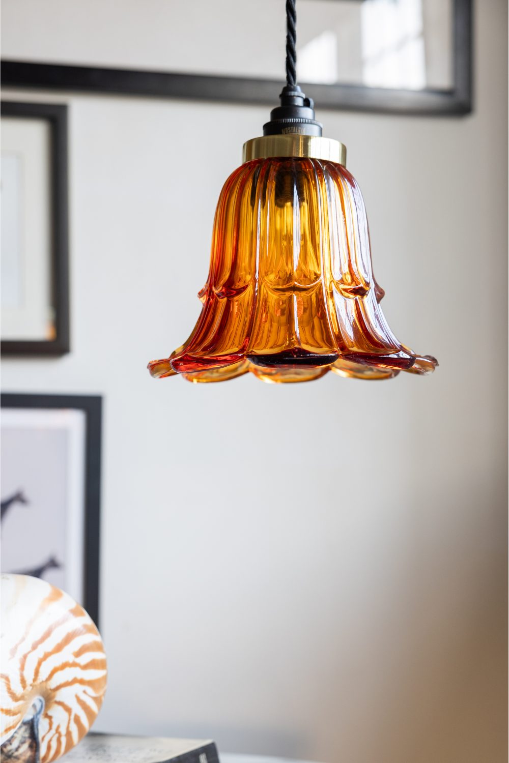 Orange glass lampshade in flower design