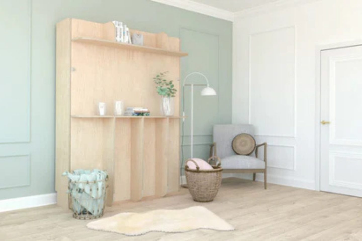 Closed Murphy bed with wooden shelving holding books and plant next to chair and white standing lamp in white and light green room 