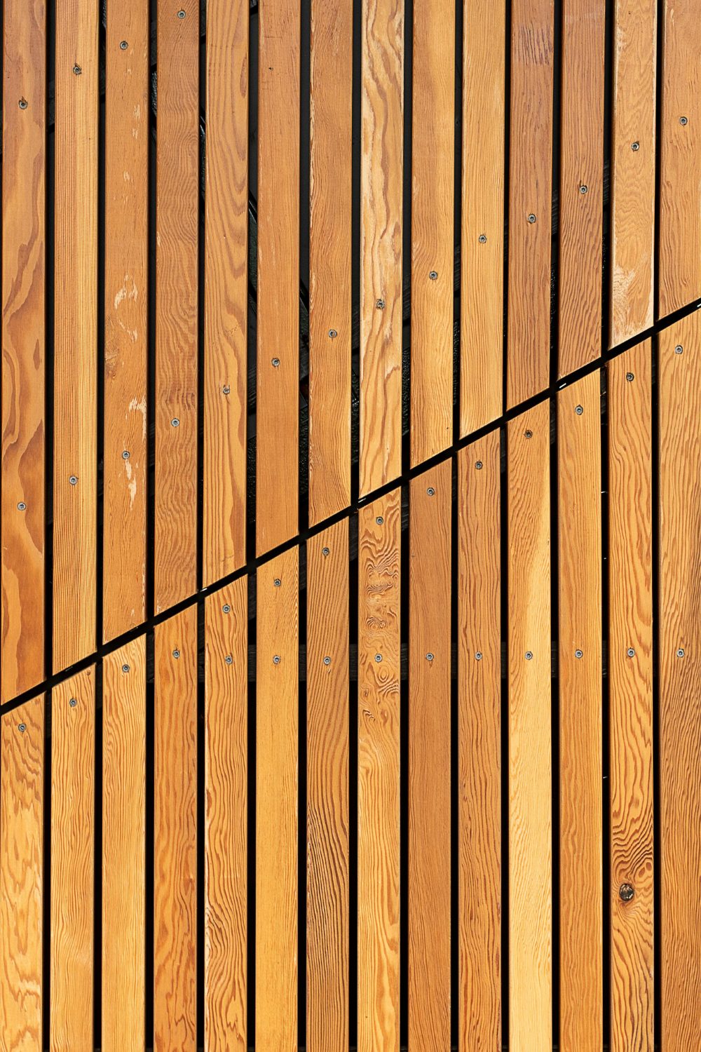 Thin wooden strips arranged diagonally into a panel
