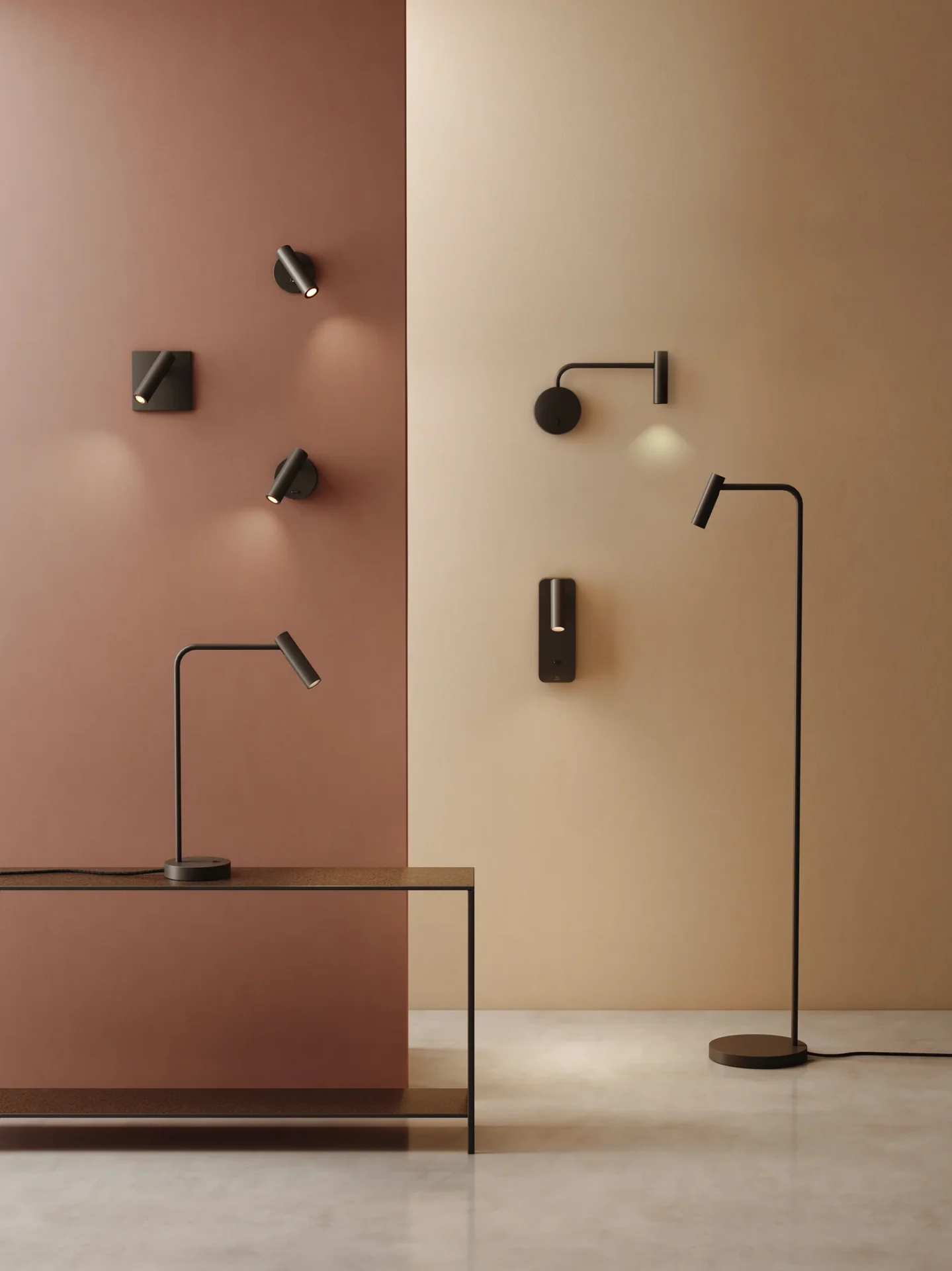 Black wall-mounted directional lights in brown room