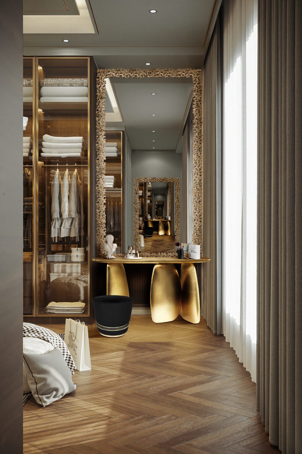 Large closet with wooden floor, gold table, mirror and wooden wardrobe with white clothes hung inside