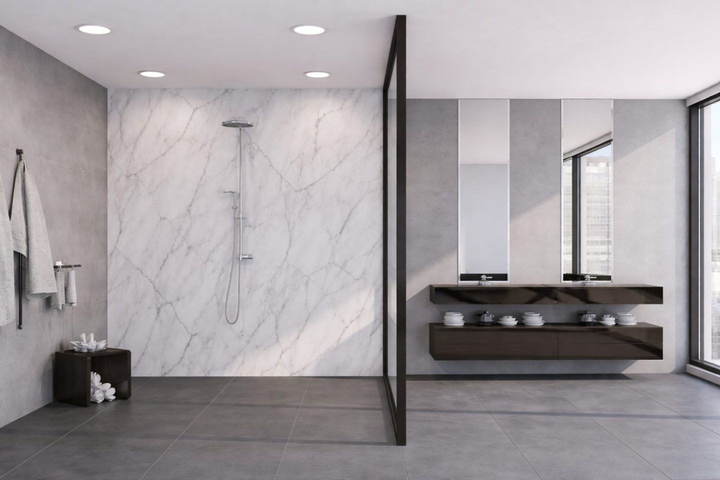 Grey bathroom with walk-in shower, black sink shelving, and double sink and mirrors. 