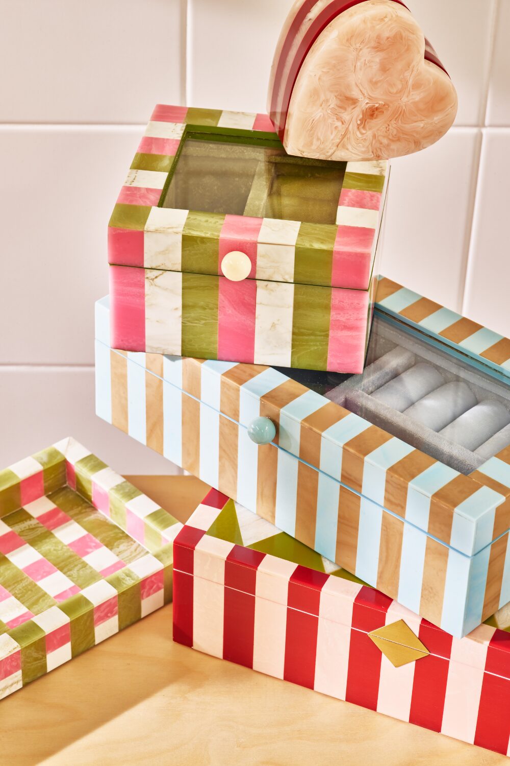 Stack of colourful striped jewellery boxes