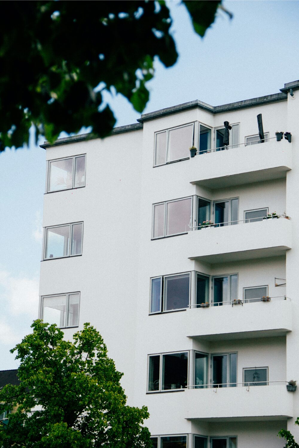 White apartment block with balconies