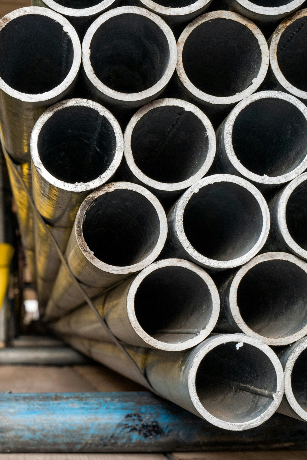 End view of multiple metal pipes tied together