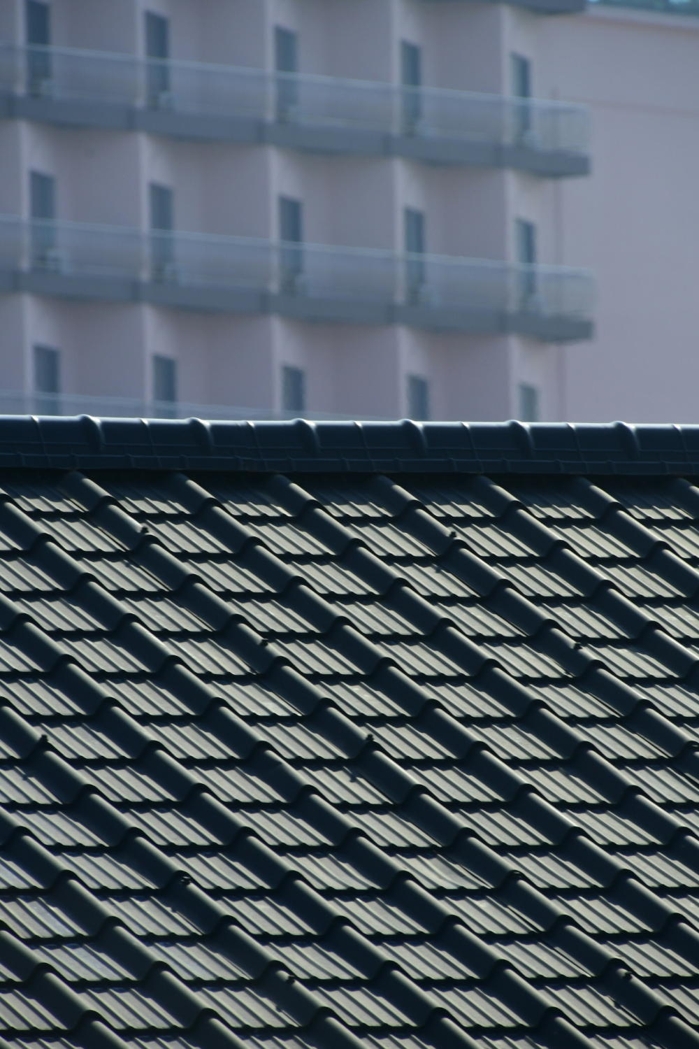 Closeup of black roofing tiles